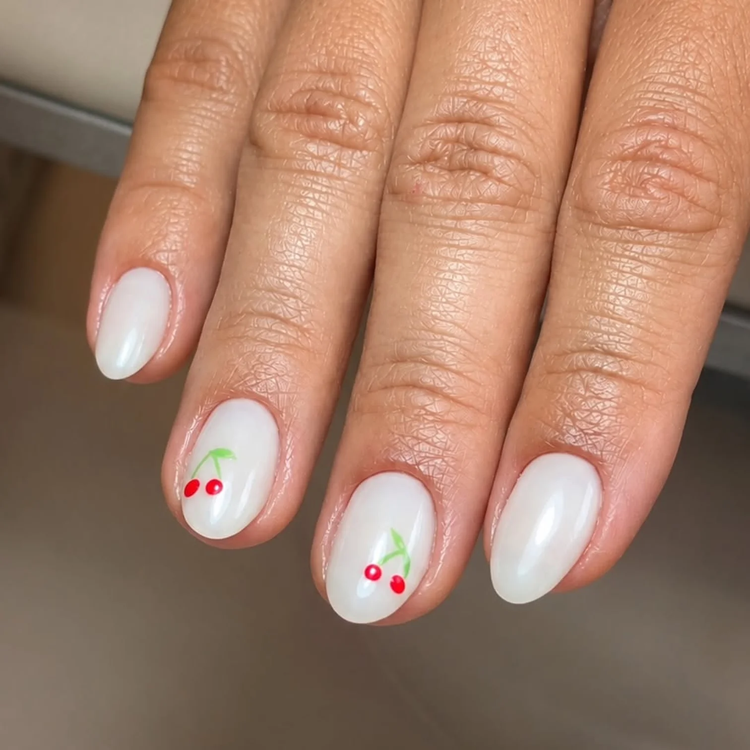 Milky nails with tiny hand-painted cherries